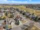 Wide aerial shot showcases homes in neighborhood near golf course at 1942 Kentmere Dr, Longmont, CO 80504