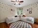 Fun, playful ' bedroom with hardwood flooring and comfortable beds at 6405 Warriors Run, Littleton, CO 80125