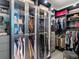 Well-organized walk-in closet with custom shelving, hanging rods, and display cases for storage at 6405 Warriors Run, Littleton, CO 80125