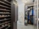 Large walk-in closet with custom shelving and shoe storage at 6405 Warriors Run, Littleton, CO 80125