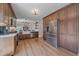 Spacious kitchen featuring stainless steel appliances, ample counter space, and wooden cabinetry at 10240 Travertine Pl, Parker, CO 80134