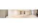 Spacious basement with a fireplace, neutral walls, and carpeted flooring at 2043 S Salida St, Aurora, CO 80013