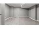 Unfinished basement room with carpeted flooring and neutral walls at 1671 S Idalia Cir # D, Aurora, CO 80017