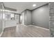 Bright living space features a breakfast bar, wood floors, and modern design at 1671 S Idalia Cir # D, Aurora, CO 80017