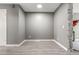 Open-concept living space featuring modern laminate flooring and stylish accents at 1671 S Idalia Cir # D, Aurora, CO 80017