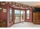 A sunny balcony retreat with sliding glass doors presents stunning views of the green golf course and distant mountains at 7965 S Eudora Cir, Centennial, CO 80122