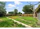 Large backyard with a wooden fence that provides privacy at 1941 Alton St, Aurora, CO 80010