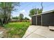Large backyard with a black shed that provides additional storage at 1941 Alton St, Aurora, CO 80010