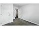 A view of the bedroom showcasing a view of the entryway and the light switches at 1941 Alton St, Aurora, CO 80010