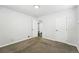 This bedroom features neutral carpet, and an adjacent closet for maximum storage solutions at 1941 Alton St, Aurora, CO 80010