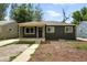 Charming single-story home featuring a welcoming front porch and tidy landscaping at 1941 Alton St, Aurora, CO 80010