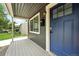 Inviting front porch with blue door and the house number prominently displayed at 1941 Alton St, Aurora, CO 80010