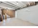 Framed unfinished basement with white floors and white wrapped walls at 454 Basin Daisy St, Castle Rock, CO 80104