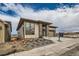 Attractive single-Gathering home with modern architectural elements and low-maintenance landscaping at 454 Basin Daisy St, Castle Rock, CO 80104