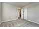Bedroom offering soft, neutral carpet and doorway to the rest of the home at 15902 Stringhalt Way, Parker, CO 80134