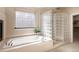 Spa-like bath with separate tub and shower at 1660 Moveen Hts, Monument, CO 80132