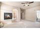 Primary bedroom featuring a fireplace and access to the patio at 1660 Moveen Hts, Monument, CO 80132