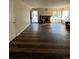 Spacious living room featuring a fireplace and wood-look flooring at 16786 E Kent Dr, Aurora, CO 80013