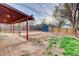 Backyard includes an outdoor living area and storage shed, plus a wooden fence at 3745 Fairfax St, Denver, CO 80207