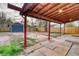 Backyard includes an outdoor living area and storage shed, plus a wooden fence at 3745 Fairfax St, Denver, CO 80207
