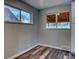 Cozy kitchen nook with dark wood flooring, and windows providing a view to the exterior at 3745 Fairfax St, Denver, CO 80207