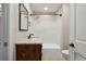 Cozy bathroom features a combination shower and tub and updated vanity with counter at 4835 Abo Ln, Monument, CO 80132