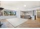 Bright living room with large windows, hardwood floors, and ample space at 4835 Abo Ln, Monument, CO 80132