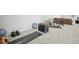 Finished basement with gym equipment and plenty of space at 1729 Santa Fe Mountain Rd, Evergreen, CO 80439