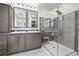 Elegant bathroom with double vanity, large shower, and modern finishes at 1729 Santa Fe Mountain Rd, Evergreen, CO 80439
