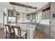 Modern kitchen with stainless steel appliances and island at 1729 Santa Fe Mountain Rd, Evergreen, CO 80439