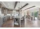 Modern kitchen with granite countertops and island at 1729 Santa Fe Mountain Rd, Evergreen, CO 80439