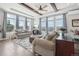 Spacious living room with mountain views and hardwood floors at 1729 Santa Fe Mountain Rd, Evergreen, CO 80439