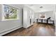 Bedroom featuring a large closet and natural light from the windows at 6990 W 9Th Pl, Lakewood, CO 80214