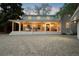 Charming home with a covered front porch, perfect for relaxing and enjoying the outdoors at 6990 W 9Th Pl, Lakewood, CO 80214