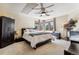 Inviting bedroom features plush carpet, large windows, and ample natural light at 2122 Cramner Ct, Evergreen, CO 80439