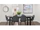 Dining area with a sleek table, modern chairs, and stylish decor at 1623 Dayton St, Aurora, CO 80010