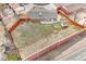 Aerial of fenced backyard with storage shed, mountain view in distance at 7162 Quay St, Arvada, CO 80003