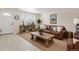 Cozy living room features neutral walls, stylish decor and ample seating at 7162 Quay St, Arvada, CO 80003