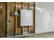 Image of Tesla Powerwall home battery backup system installed in the garage at 6660 E Floyd Ave, Denver, CO 80224