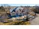 Two-story house with stone accents and landscaping; driveway and yard visible at 15050 Harrison St, Brighton, CO 80602