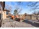 Spacious deck with seating area overlooking backyard at 15050 Harrison St, Brighton, CO 80602