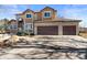 Two-story home with a three-car garage at 15050 Harrison St, Brighton, CO 80602