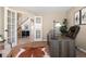 Home office with desk, chair, and view of entryway at 15050 Harrison St, Brighton, CO 80602