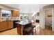 Large kitchen with granite island, breakfast bar, and lots of counter space at 15050 Harrison St, Brighton, CO 80602