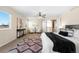 Spacious main bedroom with sitting area and king-size bed at 15050 Harrison St, Brighton, CO 80602
