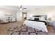 Spacious main bedroom with king bed and access to additional rooms at 15050 Harrison St, Brighton, CO 80602