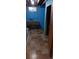Basement area with a sink, small window, and blue-painted walls at 2008 Moline St, Aurora, CO 80010