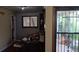 Dining room with adjacent door and window at 2008 Moline St, Aurora, CO 80010