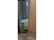 Image of a Rheem water heater with visible labeling and connection details at 2008 Moline St, Aurora, CO 80010