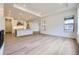 Bright open-concept living room, seamlessly connected to a modern kitchen at 15616 W Beloit Ave, Morrison, CO 80465